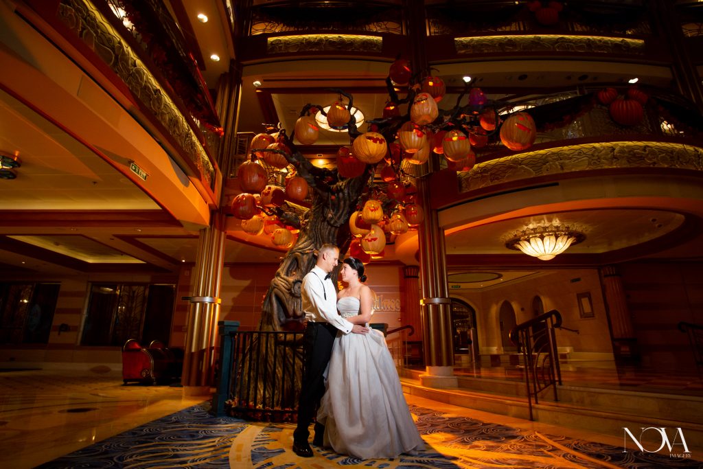 Wedding couple embracing each other during their Disney Cruise Line wedding photoshoot.
