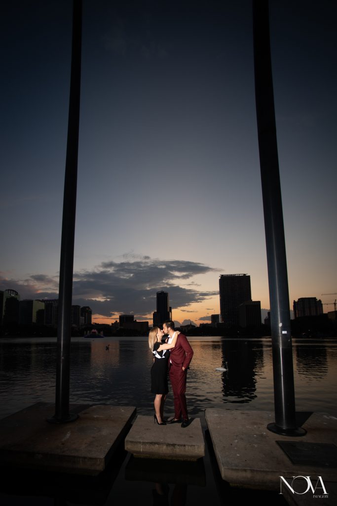 Engaged couple kissing during their Lake Eola engagement session.