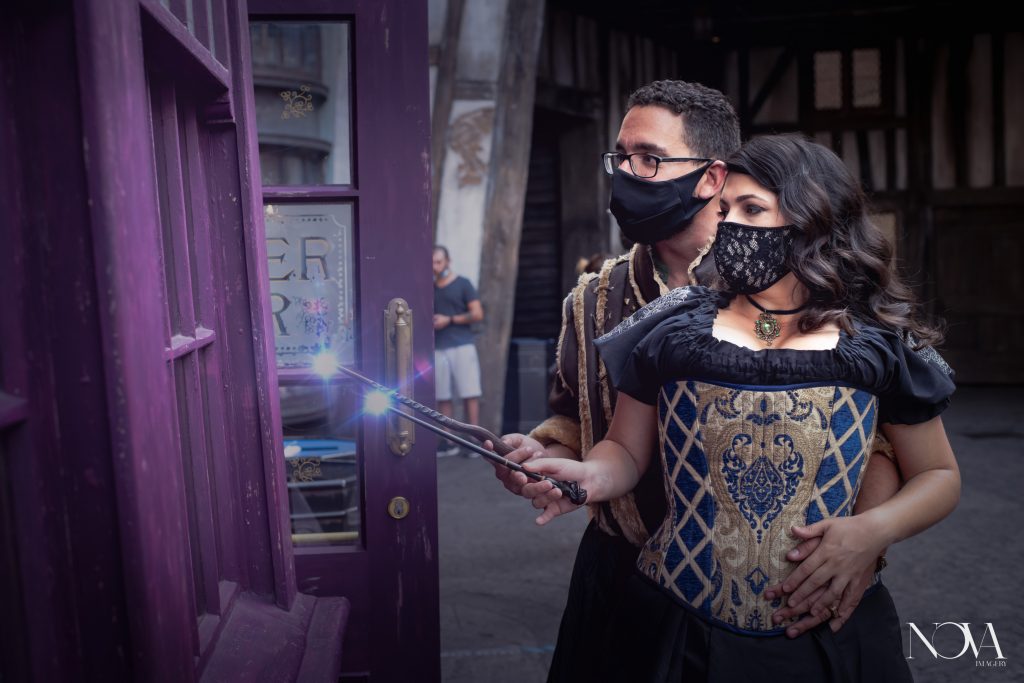 Wizardly wand magic photo of engaged couple.