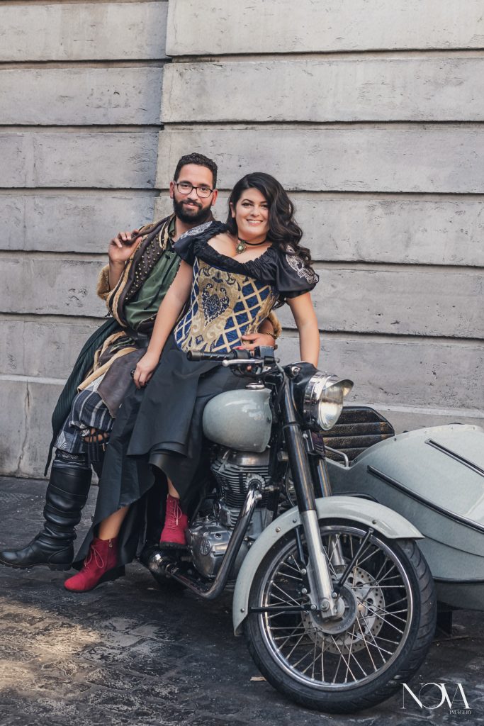 Couple sitting on motorcycle during their Universal Studios engagement session.