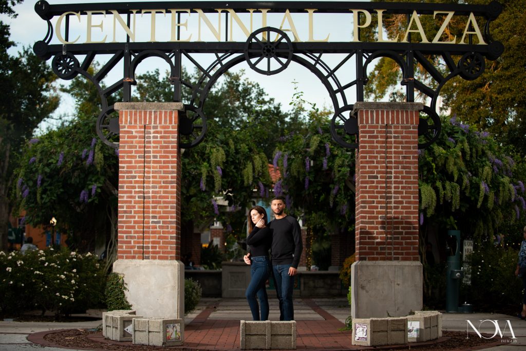 Couple in front of Downtown Winter Garden sign.