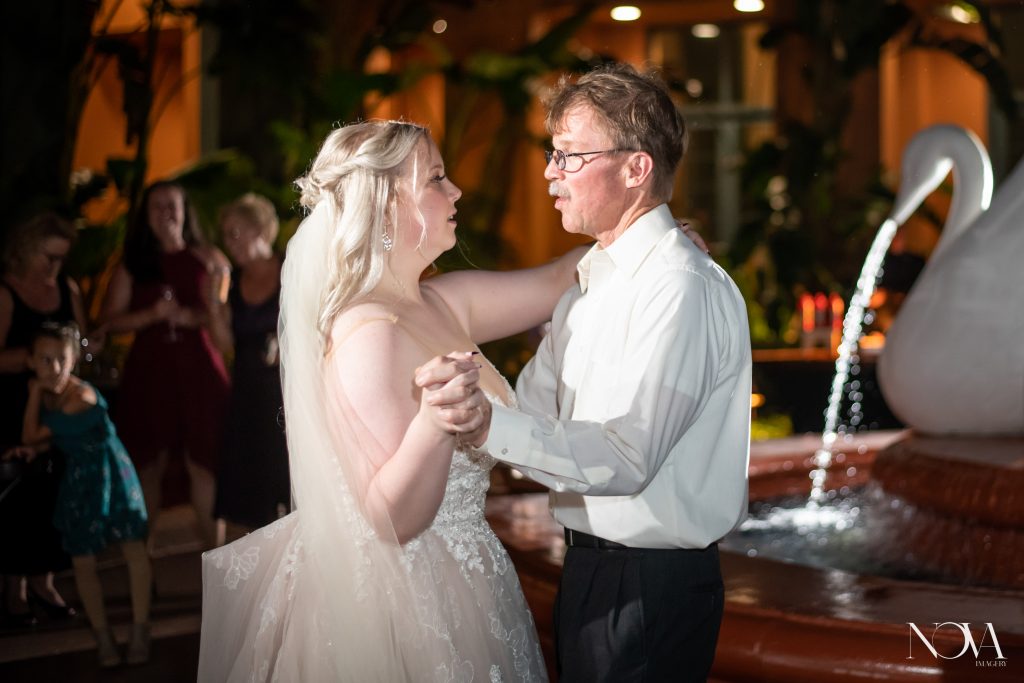 Father daughter dance during wedding reception at WDW Swan and Dolphin.