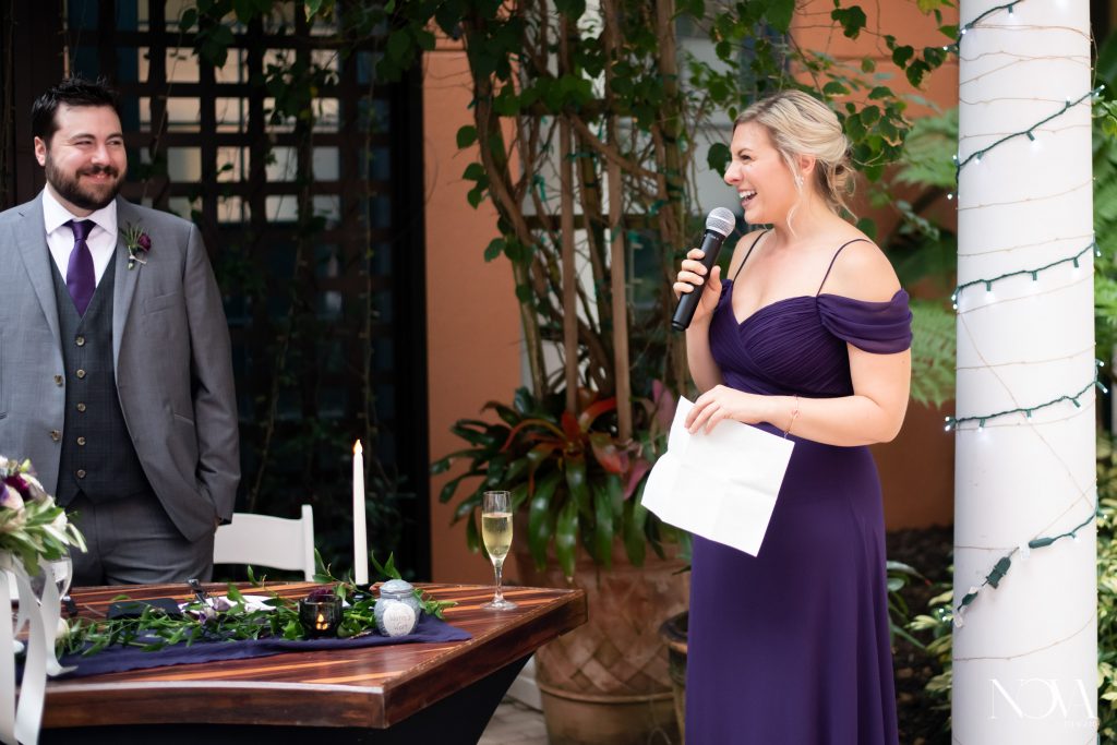 Maid of honor giving speech during wedding reception at Swan and Dolphin.