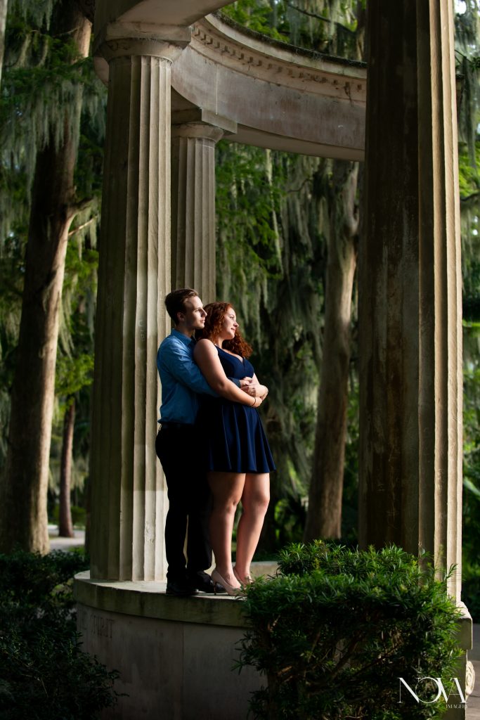 Couple holding each other during their Kraft Azalea Garden engagement photo session