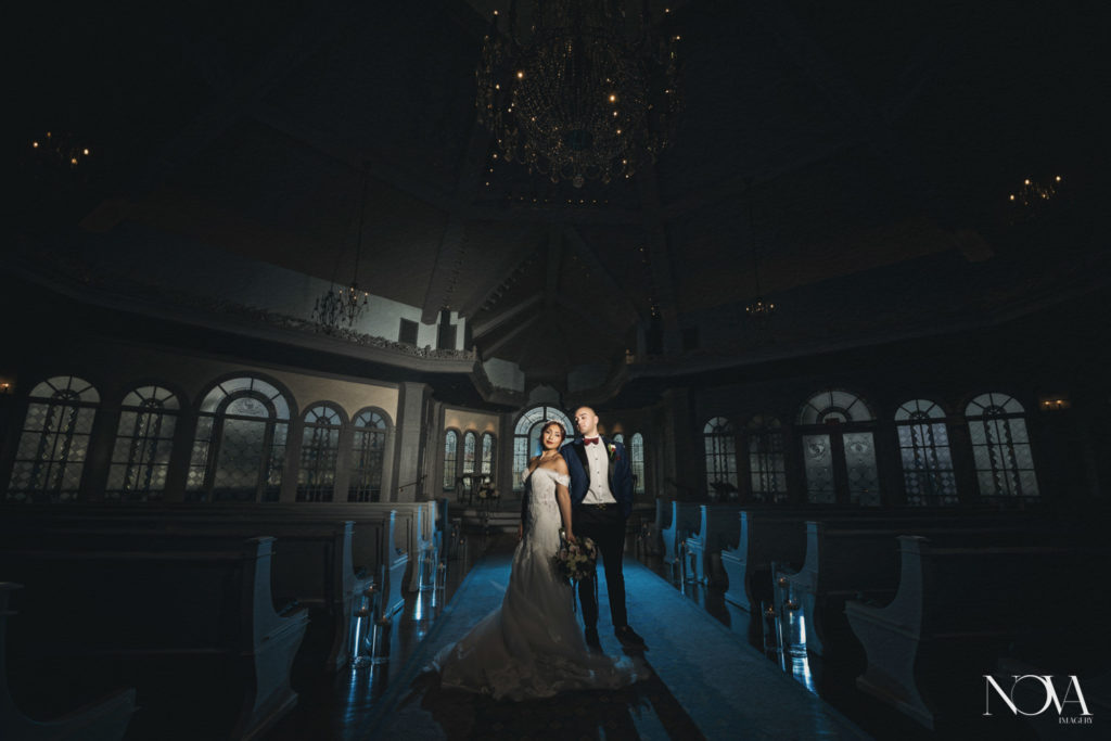 Dramatic photography of couple inside disney's wedding pavilion