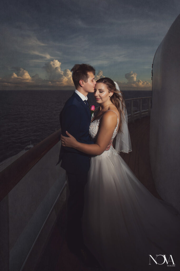 Sunset wedding photos on Disney Cruise Line.