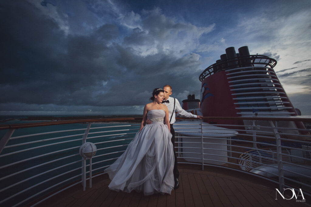 Disney wedding photographers capturing sunrise wedding photos on the deck outside.
