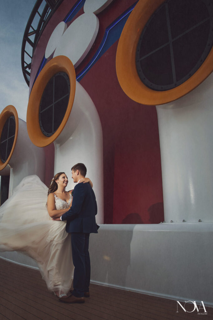 Nova imagery capturing Disney Cruise Line wedding photos outside on the top deck.