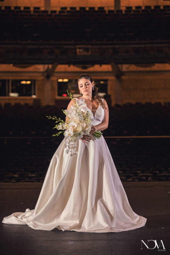 Bridal portraits inside of the Walt Disney theater at Dr Phillips Center.