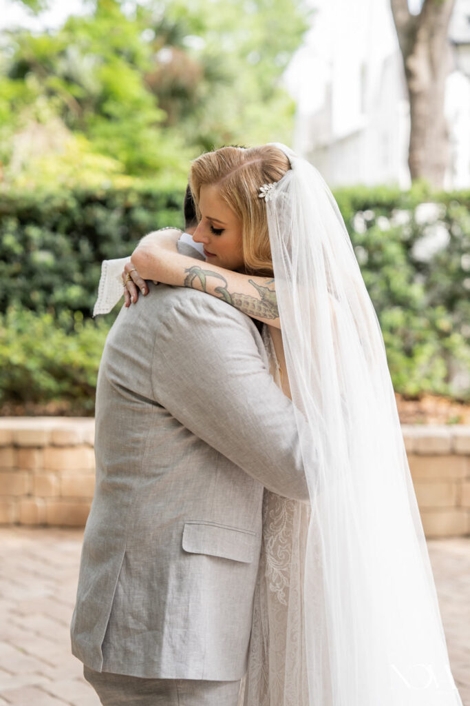 Wedding couple embrace during their wedding photography at Dr. Phillips House.