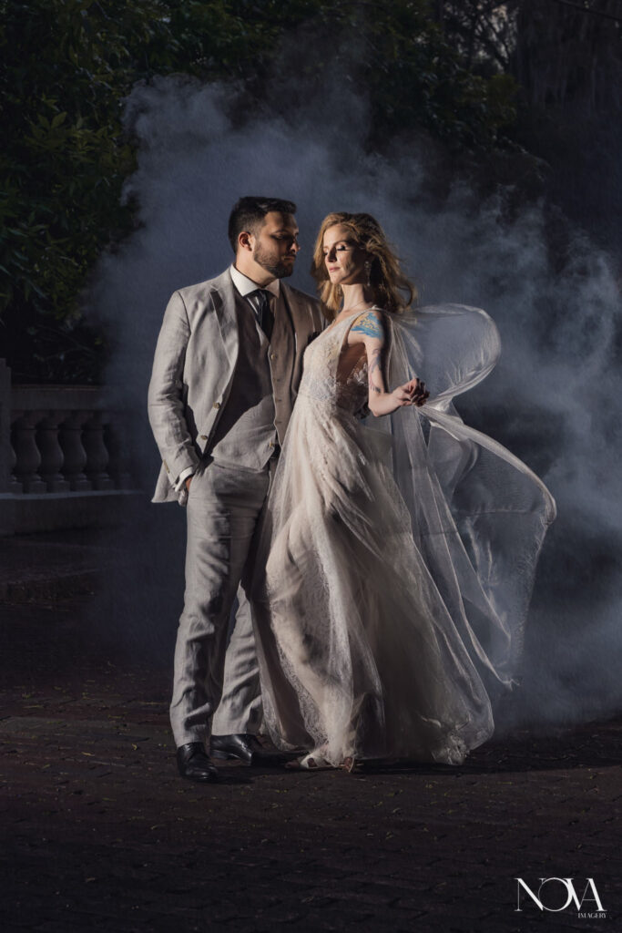 Dr. Phillips House wedding photographer, Nova Imagery captures bride and groom photography with smoke bombs.