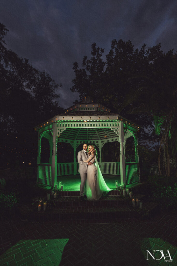 Nighttime wedding photography of newlyweds at Dr. Phillips House.