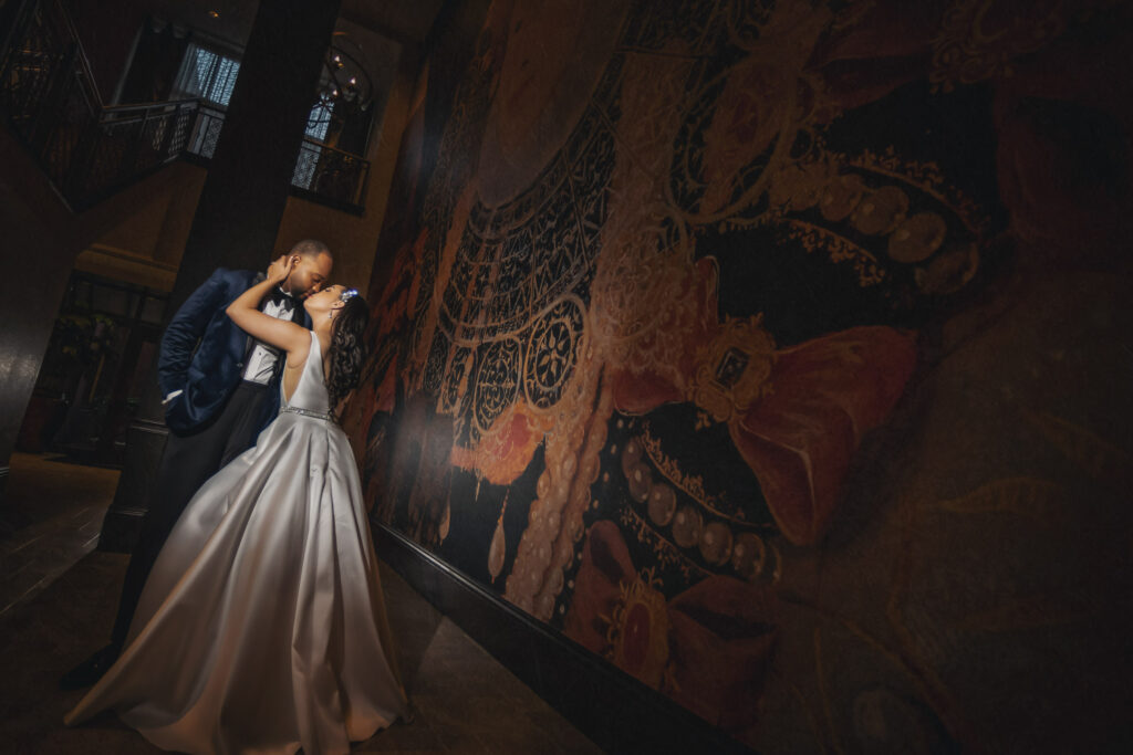 Wedding couple at their venue, wyndham grand orlando resort bonnet creek.