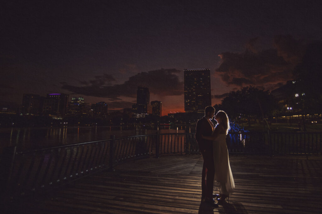Scenic lake and city skyline at Lake Eola Park, an iconic Orlando engagement photo location.