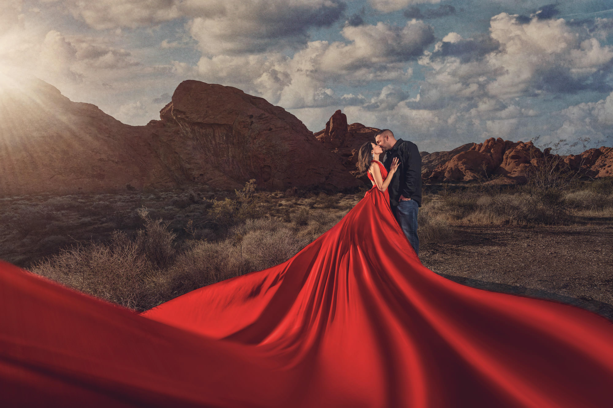 Couple kissing during orlando engagement photoshoot, at one of their locations.